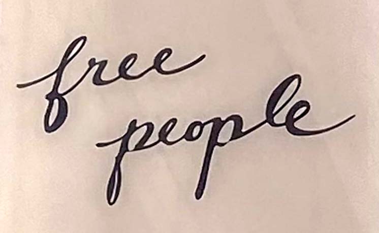 Sign at Free People shop on Duke of York Square in London's Chelsea