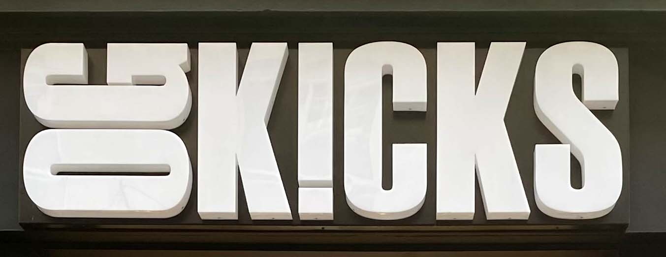 Sign at OG Kicks shop on Foubert's Place in London