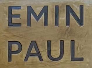 Sign at Emin and Paul womenswear shop on Monmouth Street at Seven Dials