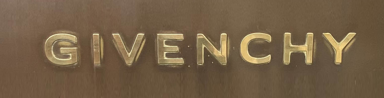 Sign at Givenchy store on New Bond Street in London