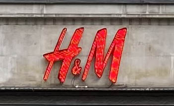 H&M store sign on Kensington High Street