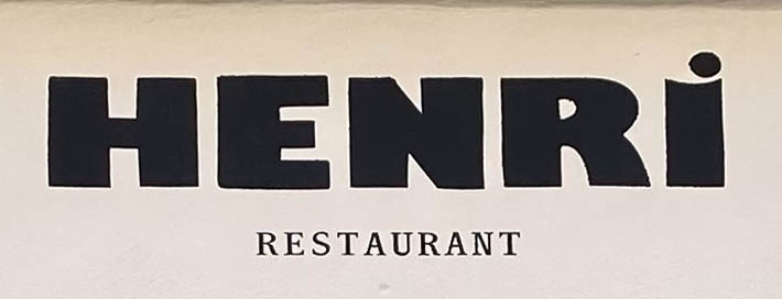 Sign at Henri restaurant on Henrietta Street in Covent Garden