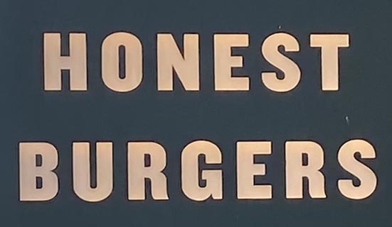 Sign at Honest Burgers restaurant on Southampton Street in London