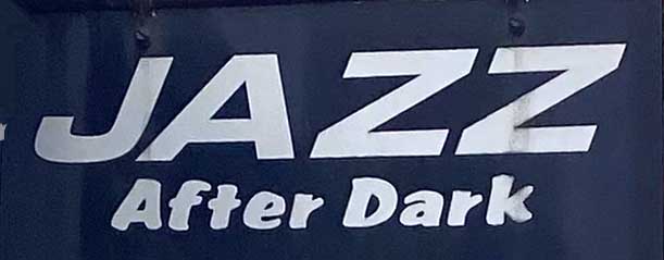 Sign at Jazz After Dark venue on Greek Street in Soho, London