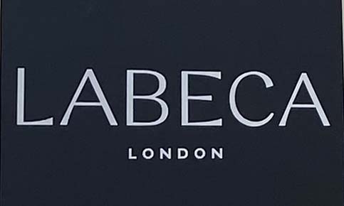 Sign at Labeca womenswear shop on Motcomb Street in Knightsbridge, London