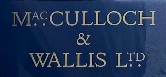 Sign at MacCulloch and Wallis shop on Poland Street in London