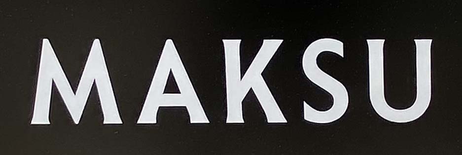 Sign at Maksu womenswear shop on Bruton Street in London's Mayfair