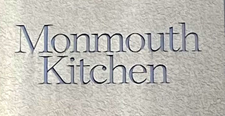 Sign at Monmouth Kitchen restaurant on Monmouth Street in London