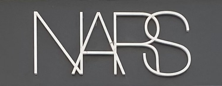 Sign at Nars cosmetics shop on King Street in London's Covent Garden