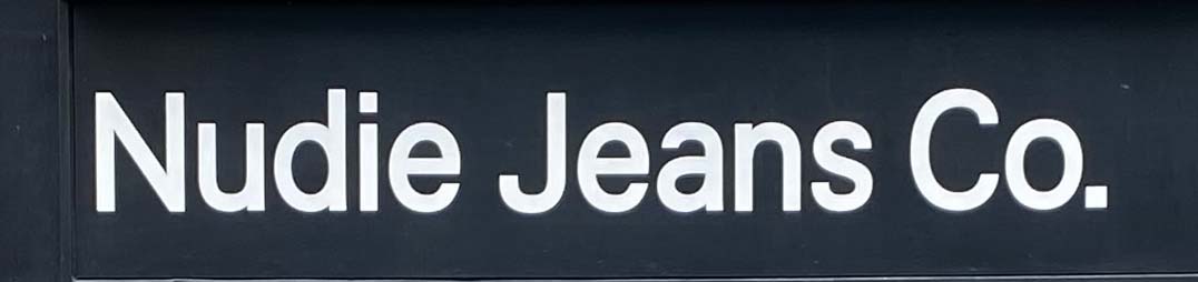 Sign at Nudie Jeans shop on Berwick Street in London