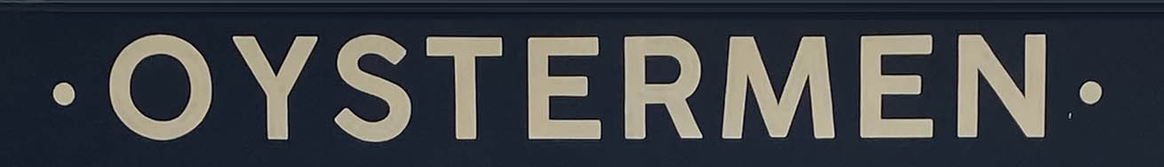 The Oystermen restaurant sign on Henrietta Street in London's Covent Garden