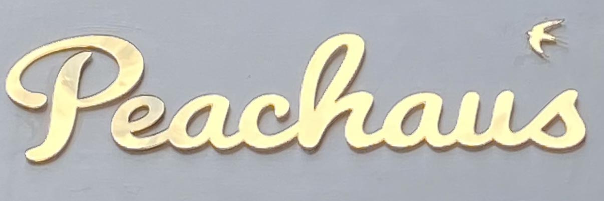 Sign at Peachaus shop on Monmouth Street in London's Seven Dials