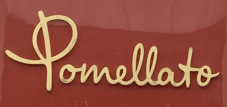 Sign at Pomellato shop on New Bond Street