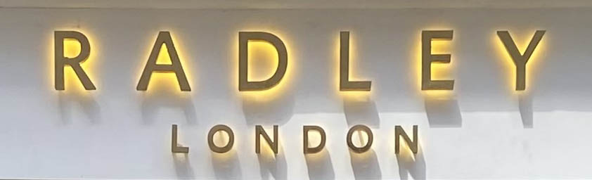 Sign at Radley bags shop on Floral Street in London