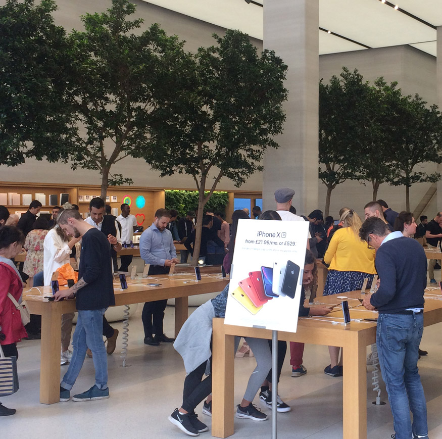 Customers at the Apple Store on London's Regent Street