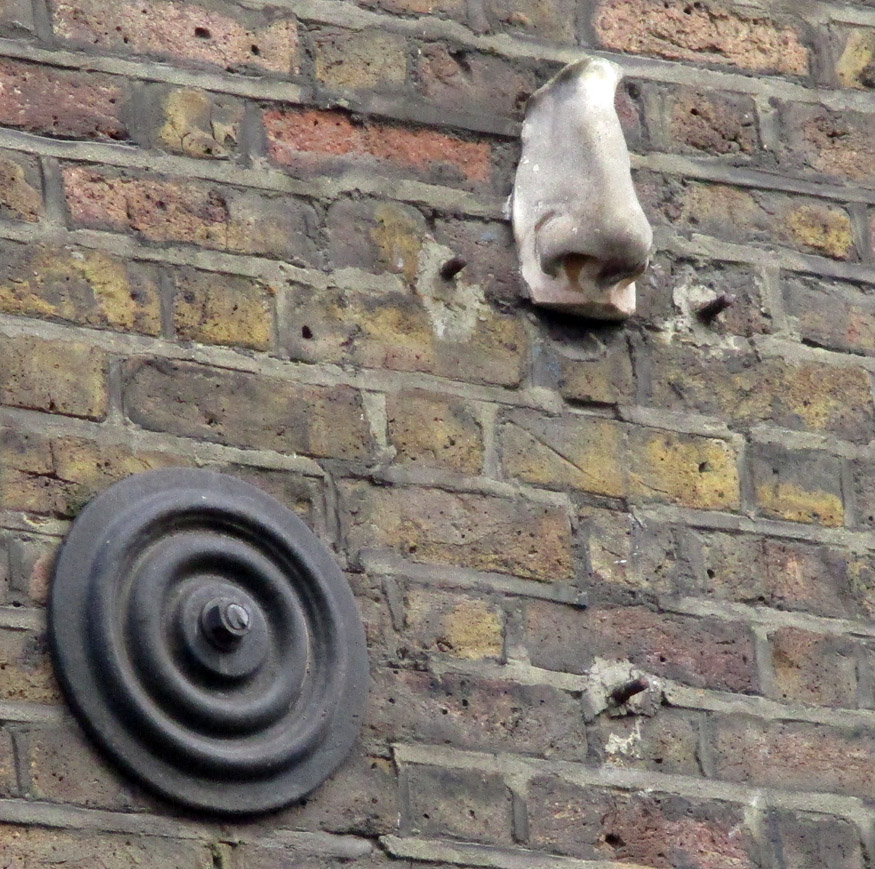 Nose sculpture on wall in Meard Street, off Dean Street in Soho