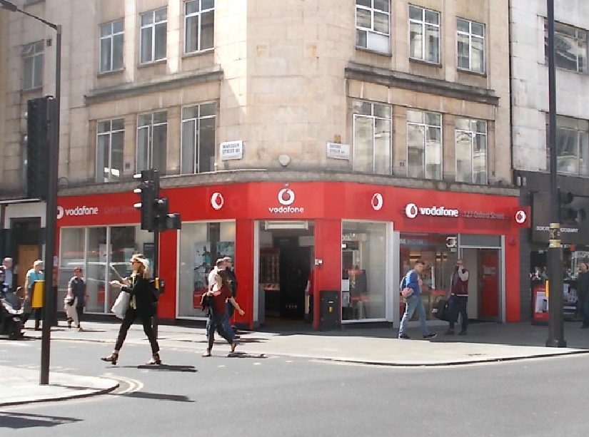 Vodafone shop on London's Oxford Street, corner of Wardour Street